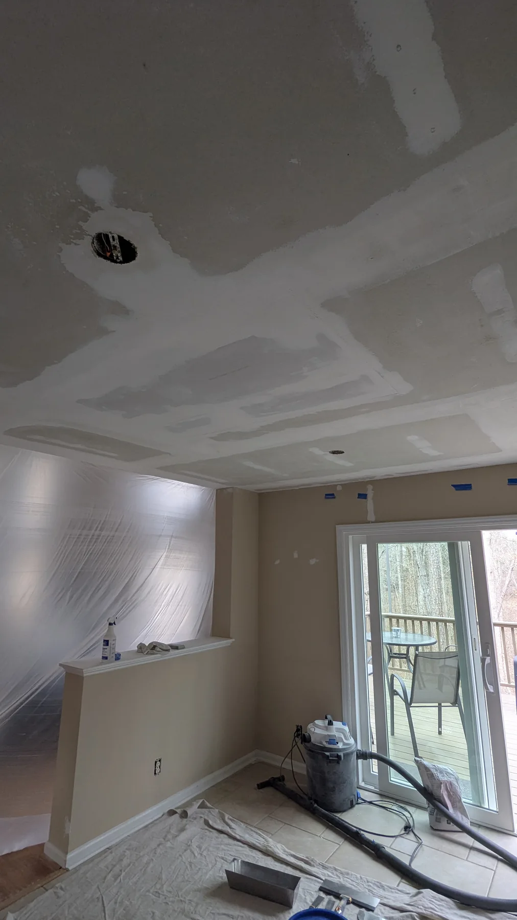 Ceiling with patched areas prepared for finishing