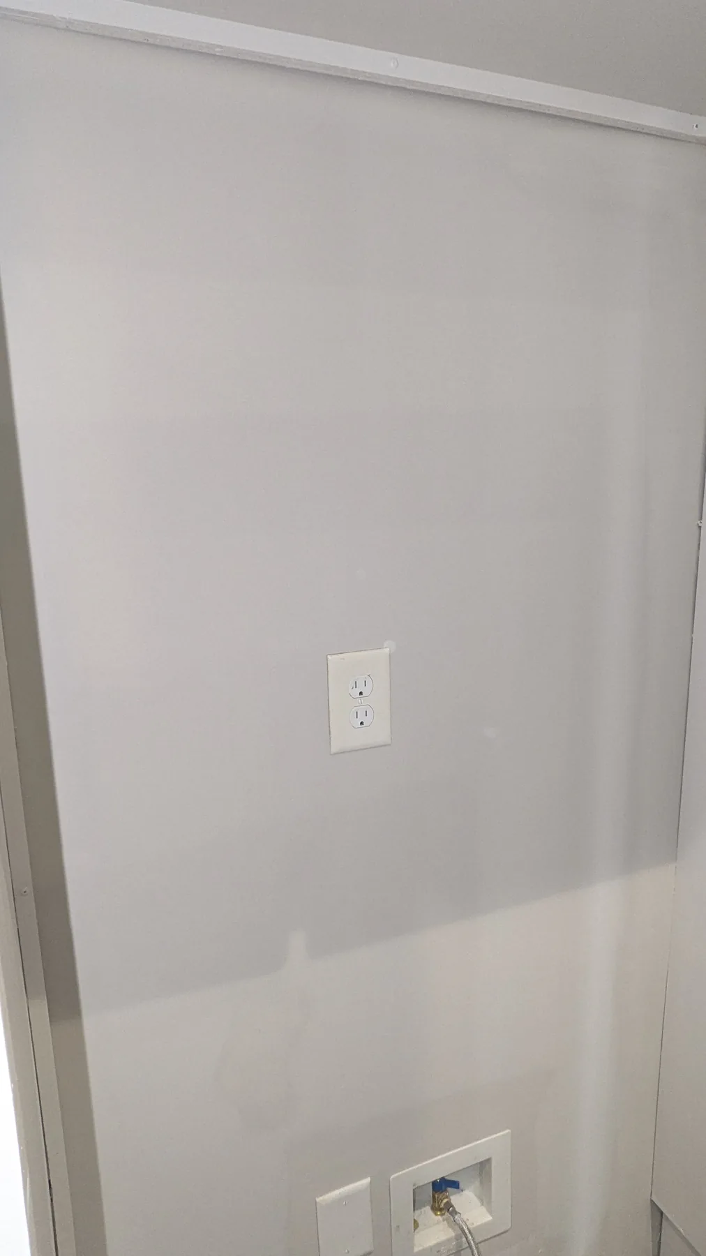 Wall with horizontal patched areas before finishing