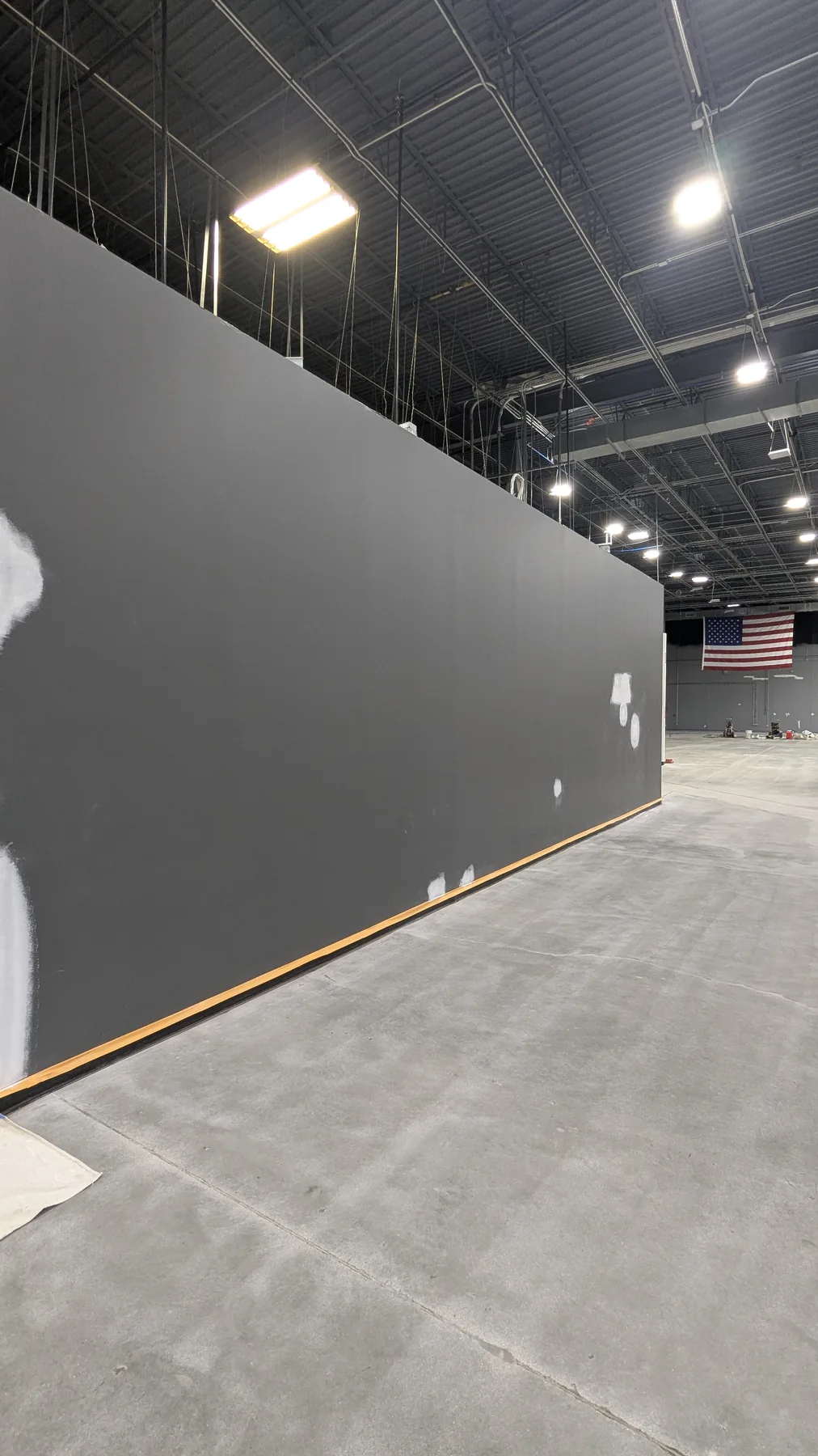 White commercial partition walls during painting